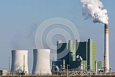 Large producing factory with cooling towers and chimney Stock Photo