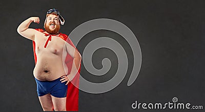 Big fat naked man in a superhero costume shows the muscles on hi Stock Photo