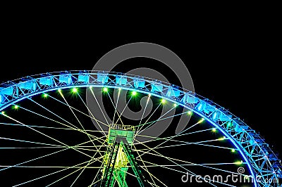 Big ferris wheel with festive green and blue illumination Editorial Stock Photo