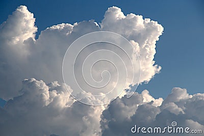 Big Fluffy Cloud contrast blue skies Stock Photo