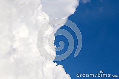 Big Fluffy Cloud contrast blue skies Stock Photo