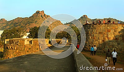 People on the big fort battlement and large wall at vellore fort with sunset Editorial Stock Photo