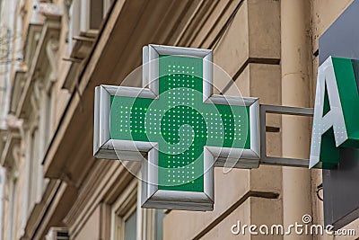 Green Cross Led Sign Stock Photo