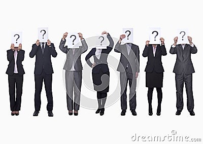 Medium group of business people in a row holding up paper with question mark, obscured face, studio shot Stock Photo