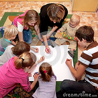 Big happy family drawing a heart together Stock Photo