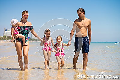 Big happy family is having fun at beach. concept of a large family at sea.beach fashion. Stock Photo