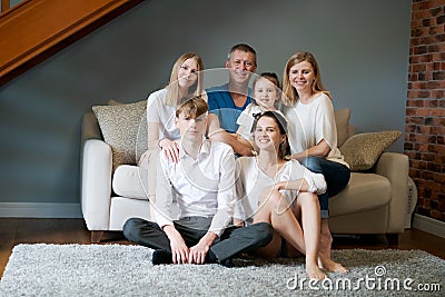 Big happy family. Portrait grandparents, mother father and their two lovely Stock Photo