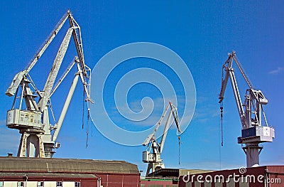 Big harbor cranes in Bilbao port - Spain Stock Photo