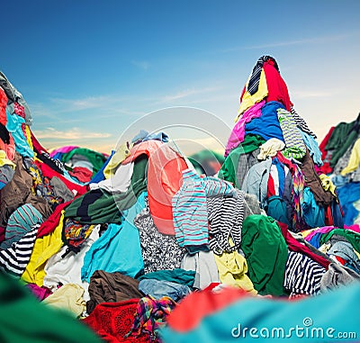 Big heap of colorful clothes Stock Photo