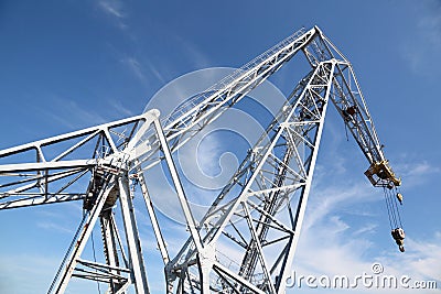 Big hoisting crane with hook Stock Photo
