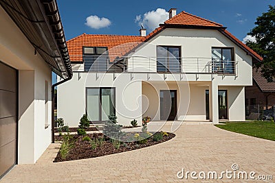 Big house with outbuilding Stock Photo