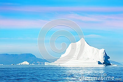 Big iceberg in Ilulissat icefjord at sunset, Greenland Stock Photo