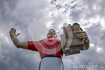 Big John Muffler Man holding groceries Editorial Stock Photo