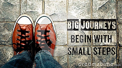 Big journeys begin with small steps, Inspiration quote Stock Photo