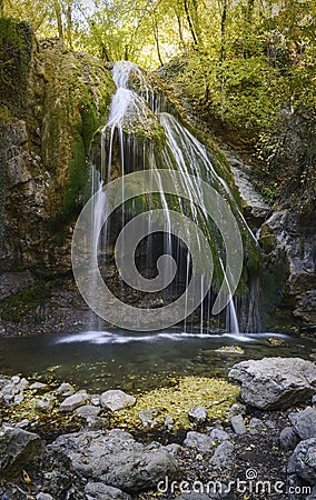 Famous Jur-Jur Waterfall. Autumn in Crimea. Vertical image Stock Photo