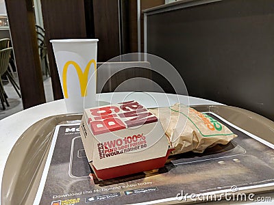 Big Mac and Classic Chicken Sandwich with Drink on a tray Editorial Stock Photo