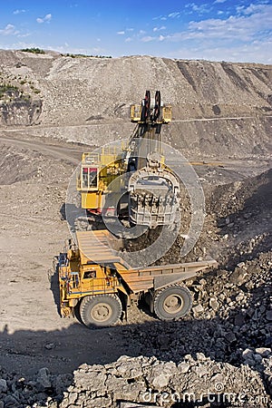 Big mining truck and excavator Stock Photo