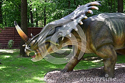 Big model of prehistoric dinosaur styracosaurus in nature. Realistic scenery Editorial Stock Photo