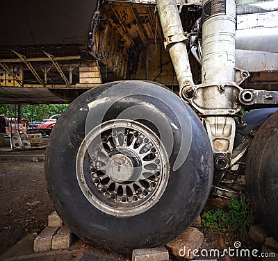 Big Old Aircraft Overhaul in Airplane Junkyard. Aircraft Being Dismantle To Its Component Stock Photo