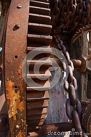 Big old rusty gear heavy industry mechanism chain Stock Photo