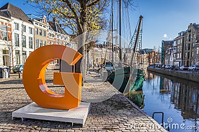 Big orange letter G in the historic center of Groningen Stock Photo