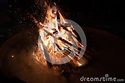 Big outside fire in summer night Stock Photo