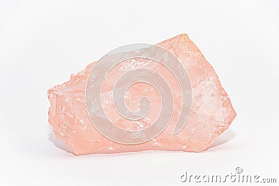 Big piece of rose quartz SiO2 unpolished with uneven shiny surfaces Stock Photo