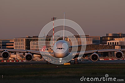 Big plane taxiing in Dusseldorf Airport, DUS Editorial Stock Photo
