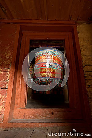 Big prayer wheel khumjung monastery Stock Photo