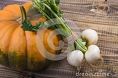 Big pumpkin and turnips Stock Photo
