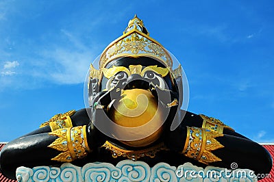 Big Rahu eat the moon sculpture in temple Stock Photo