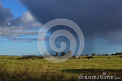 Big rainy clouds in a faraway Stock Photo