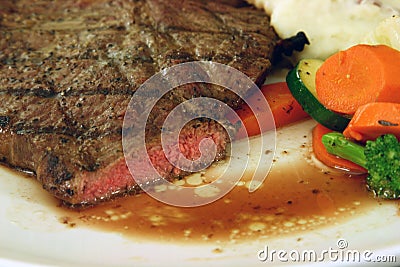 Medium rare steak Stock Photo