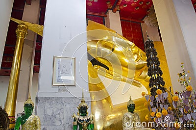 Big reclining buddha statue in ubosot at Wat Phra Non Chakkrasi Worawihan in Singburi city of Sing Buri, Thailand Editorial Stock Photo