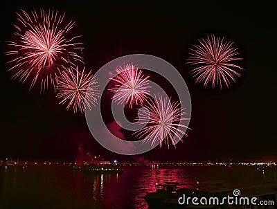 Big red fireworks explode in Venice in dark sky,New Year fireworks in Venice, 4 July, Independence, fireworks explode, New Year, V Stock Photo