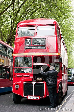 Big red London bus open hood Editorial Stock Photo