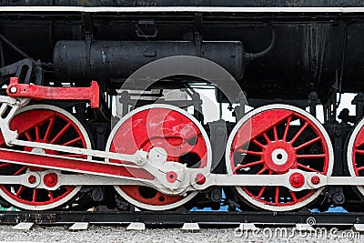 Big red wheels of a old train Stock Photo