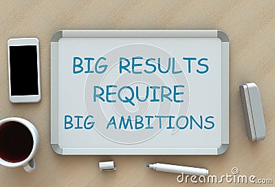 Big Results Require Big Ambitions, message on whiteboard, smart phone and coffee on table Stock Photo
