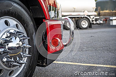 Big rig semi truck Wheel with aluminum rim and chrome grille guard Stock Photo