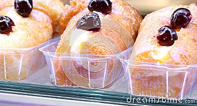 Big rum baba typical cake of south europe Stock Photo