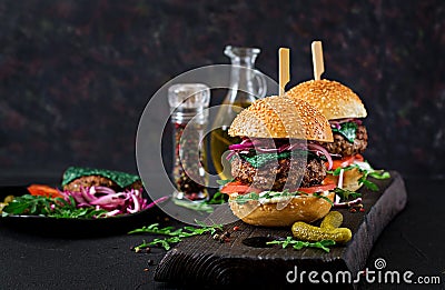 Big sandwich - hamburger burger with beef, tomato, basil cheese Stock Photo