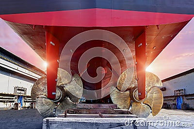 Big Ship closeup Twin propeller Detail of black stern and ship propeller. Stock Photo