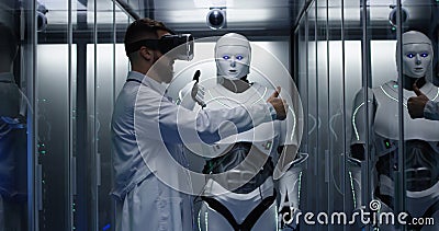 Engineer testing on robot controls Stock Photo