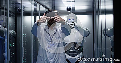 Engineer testing on robot controls Stock Photo