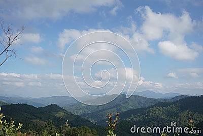 Big and small clubs and Green mountains peaks Stock Photo