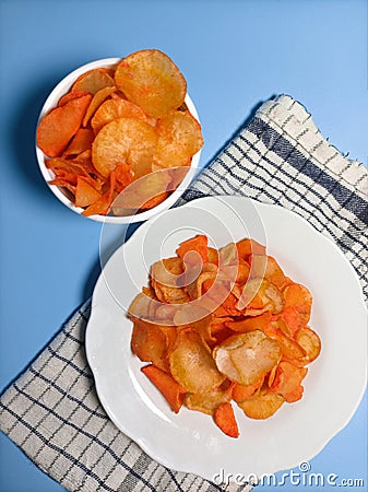 Big and small packages of spicy cassava chips menu Stock Photo