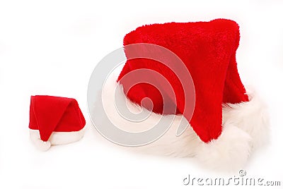 Big and small santa hats Stock Photo