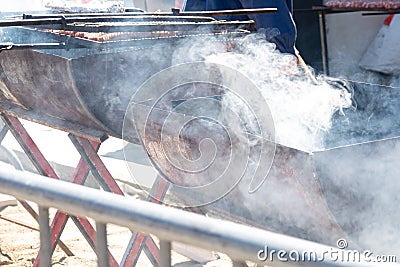 A big smoking grill Stock Photo