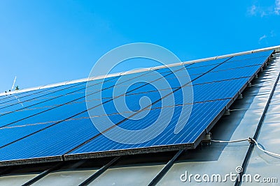 Big solar energy panel on the roof of a house Stock Photo