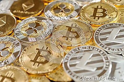 Stack of bitcoin, ripple, etherum and litecoin coins. Virtual currency concept. Editorial Stock Photo